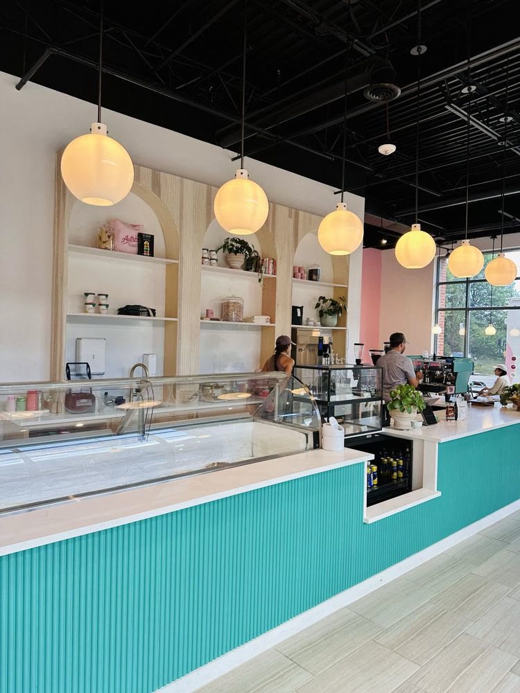 Author's Ice Cream as built: the same arched shelves, globe pendants and counter