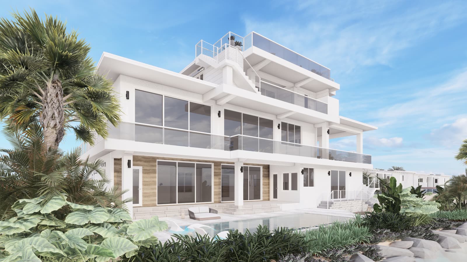 Strange Residence: the rear of the house with terraces and tropical planting